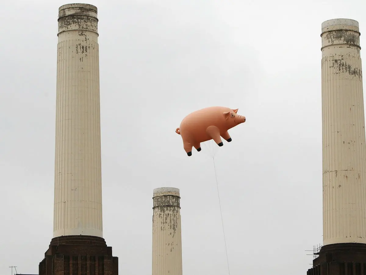The iconic "Animals" album cover or the pig floating free in London's skyline