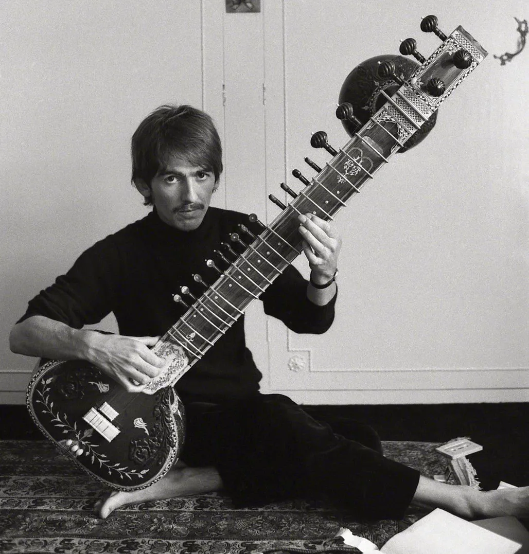 George Harrison playing the sitar