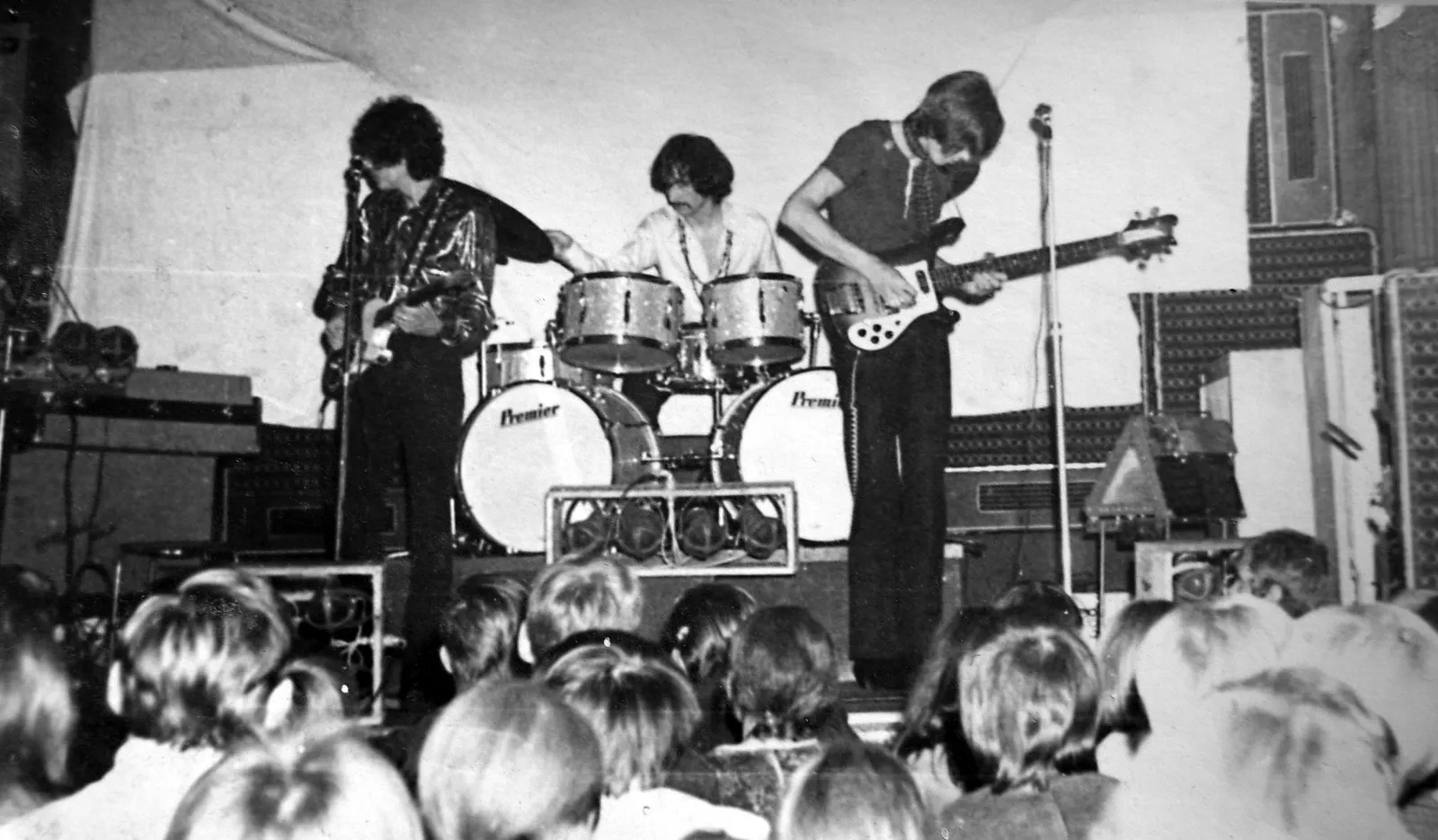 A vintage shot of Pink Floyd in their early days on a small stage