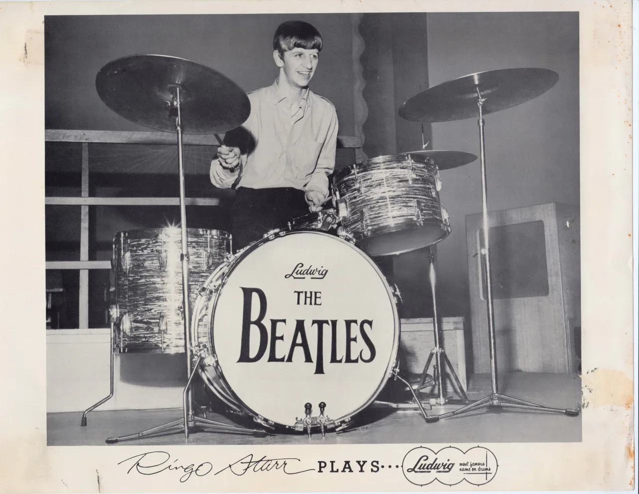 Ringo playing drums in the early days of the Beatles