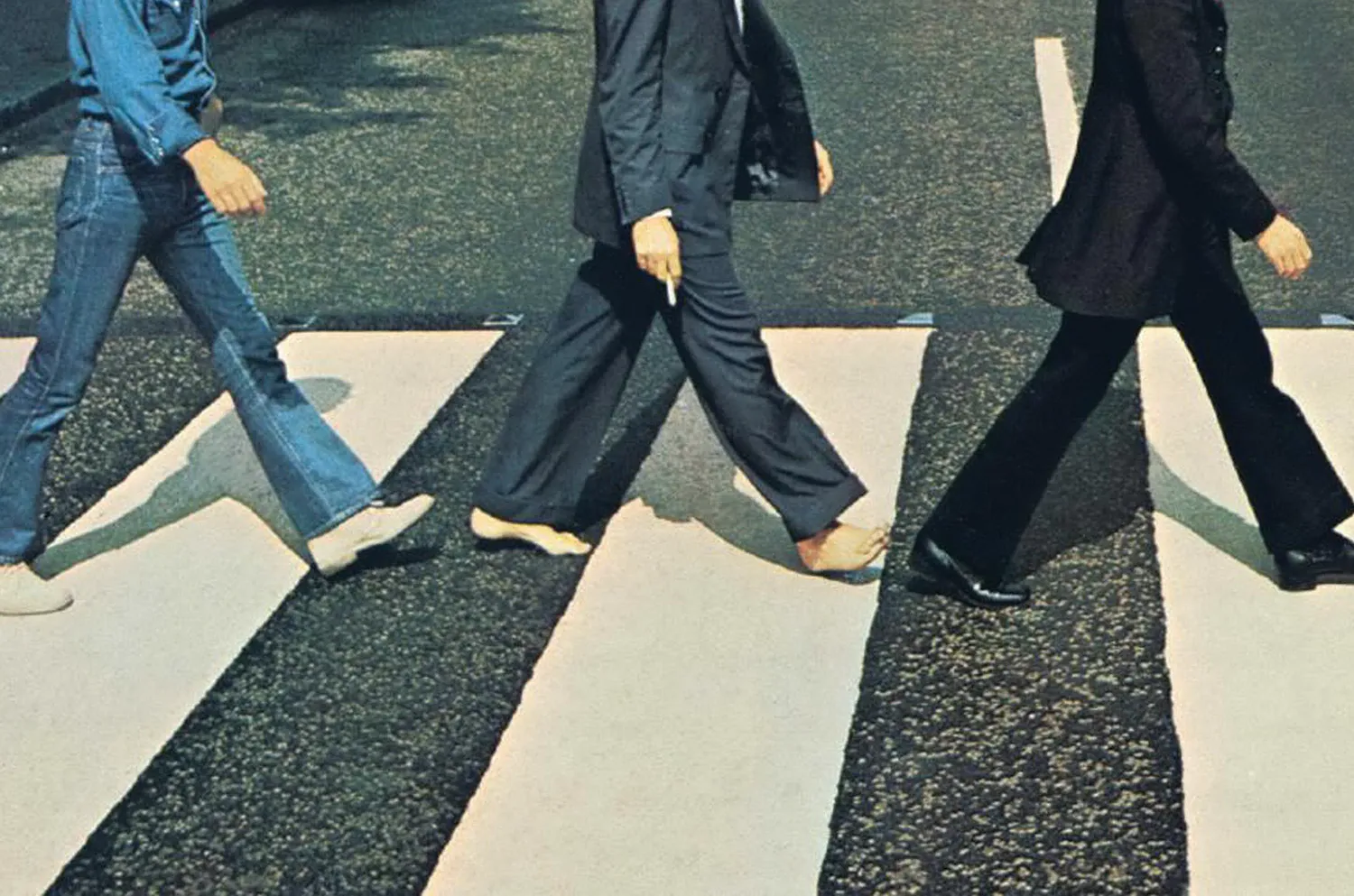The "Abbey Road" album cover with a focus on Paul's bare feet