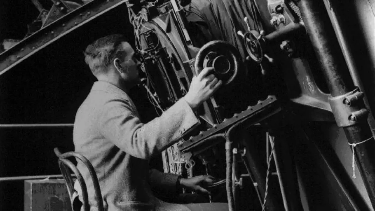 Edwin Hubble with his ground-based telescope