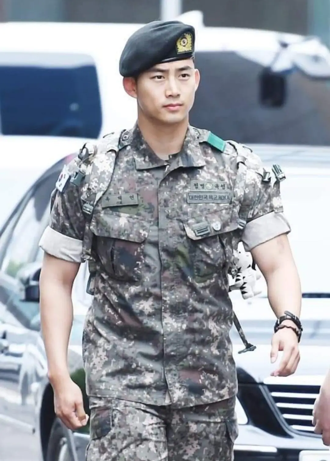 K-pop idol in military uniform
