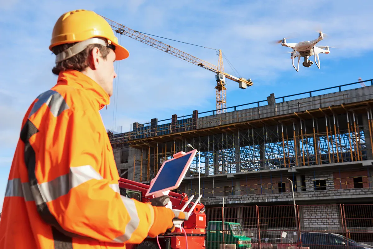 Drone hovering over a large construction site