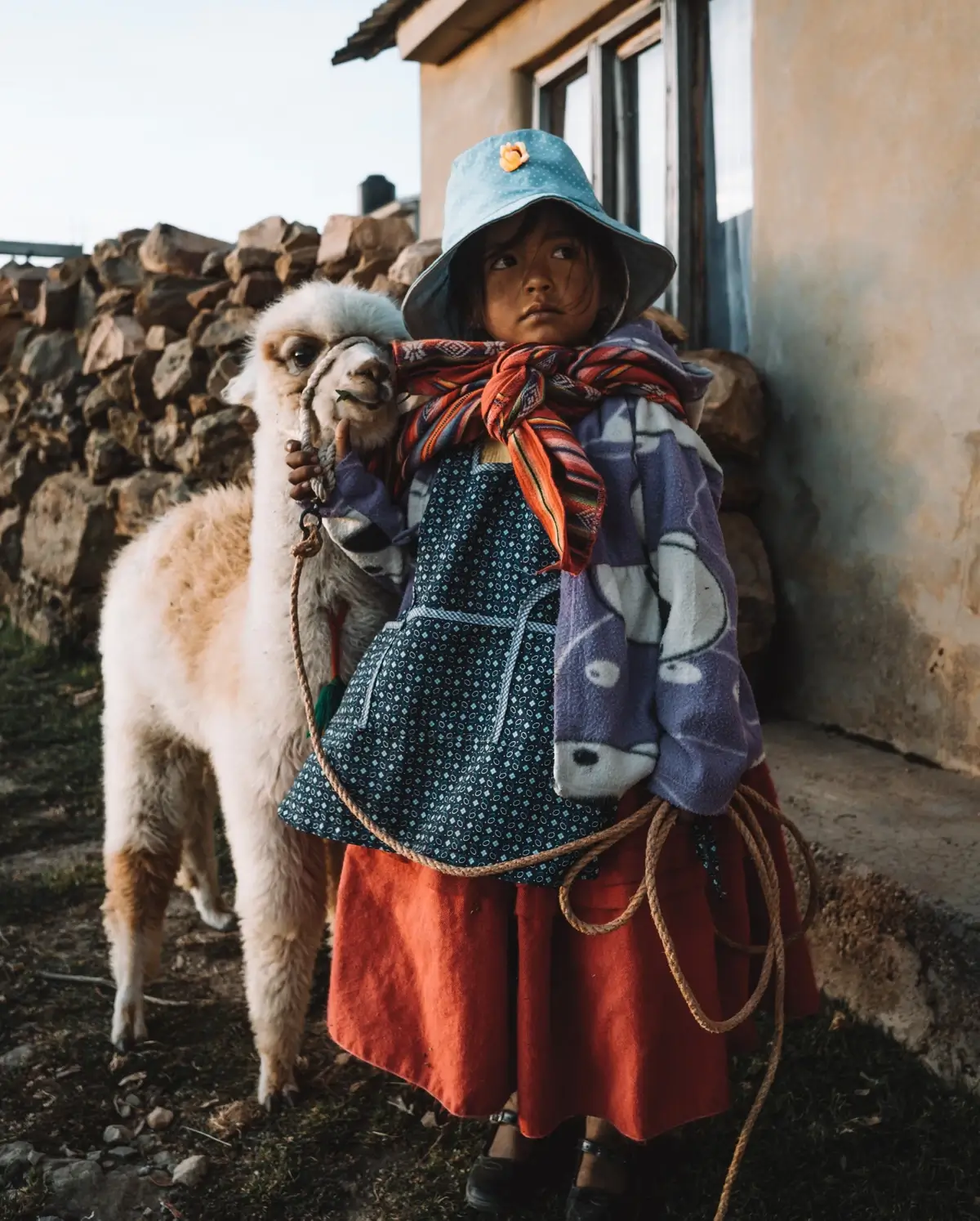 Little girl and her llama in Bolivia