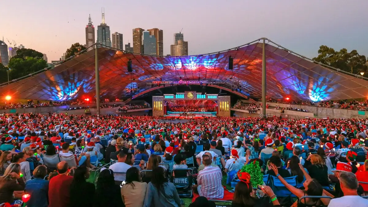 A wide-angle shot of the "Carols by Candlelight" event