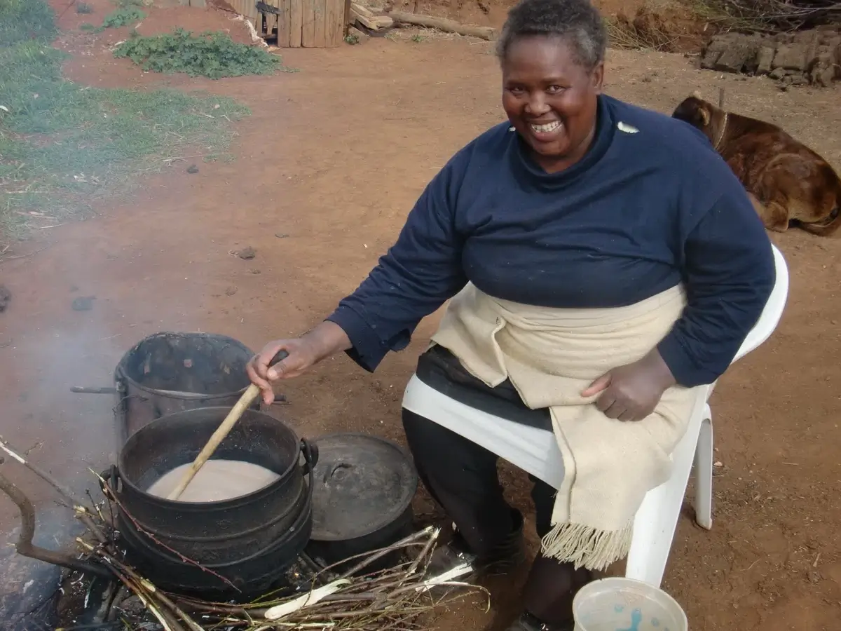 Lesotho woman cooks motoho