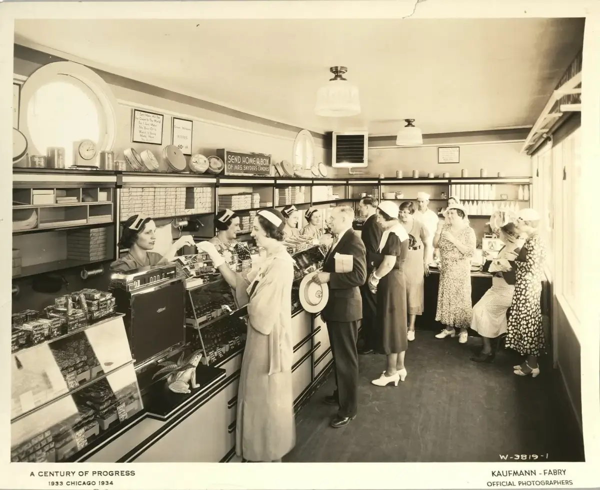 Customers line up inside Mrs. Snyder's shop, Chicago, 1933