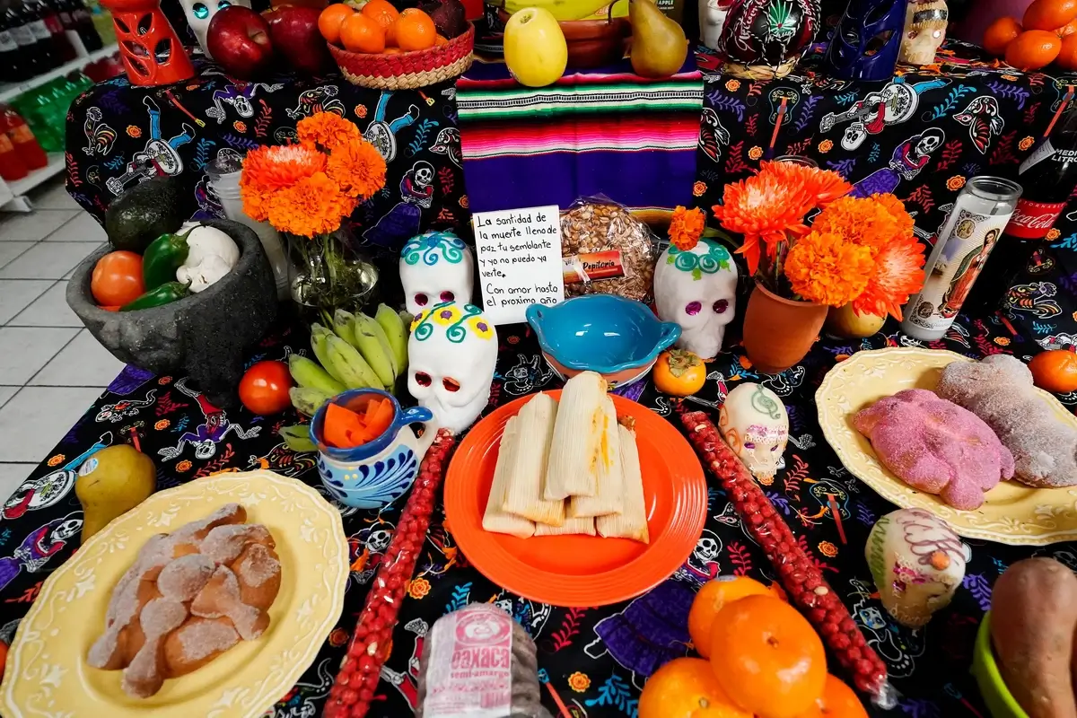 Traditional Day of the Dead dishes laid out on an altar