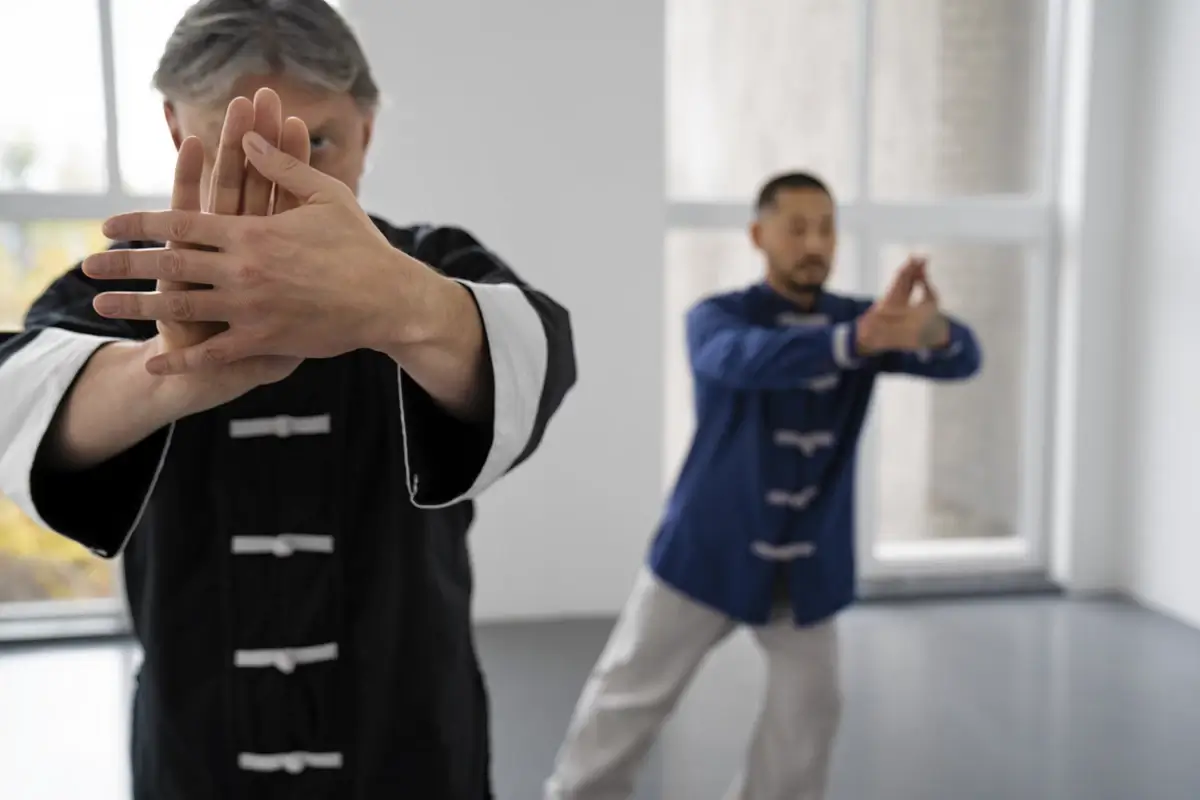 People practicing Tai Chi together, front view