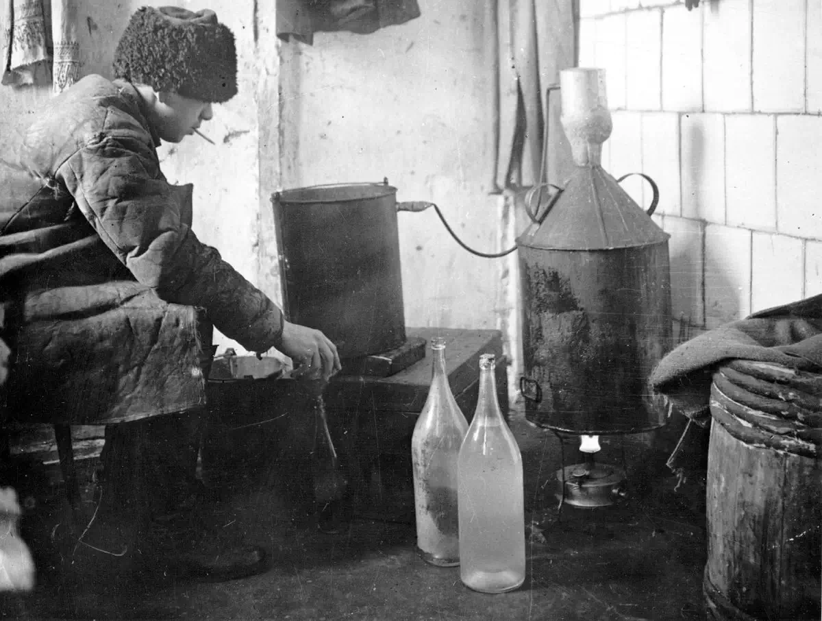 Around 1930, a bootlegger concocts samogon, a cherished homemade spirit, in post-revolutionary Russia