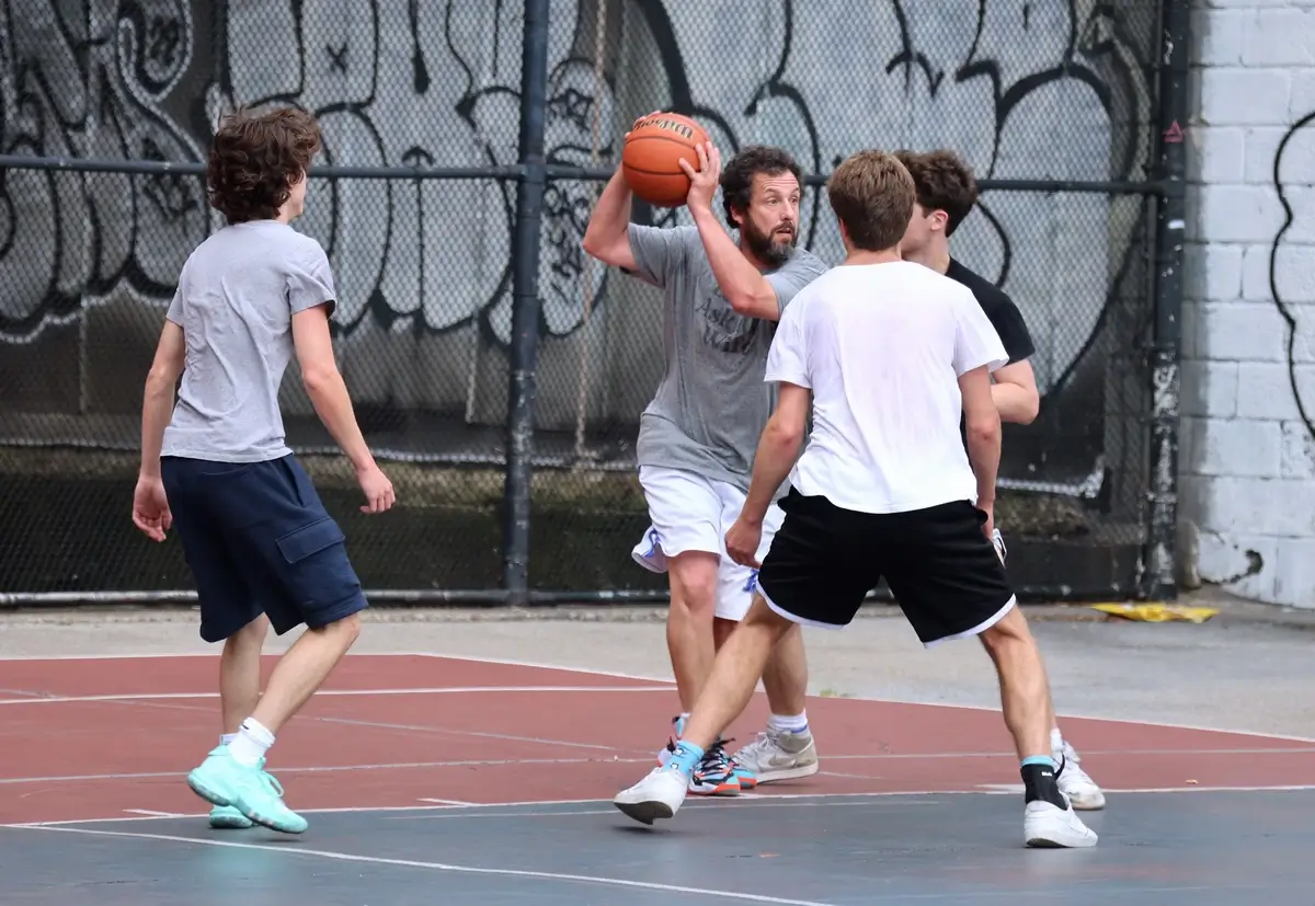 Adam Sandler playing basketball