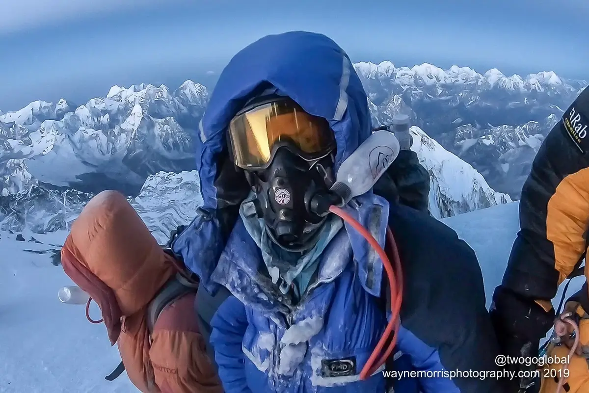 Climbers using oxygen masks near the summit of Everest