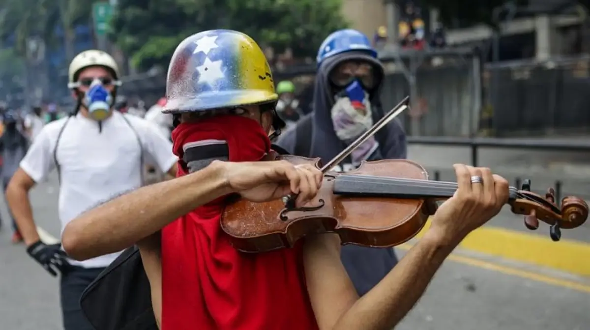 Violinist playing at a peaceful protest