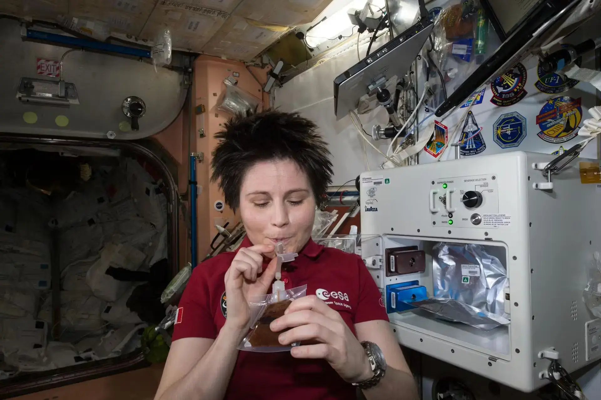 An astronaut enjoying tea in a space station