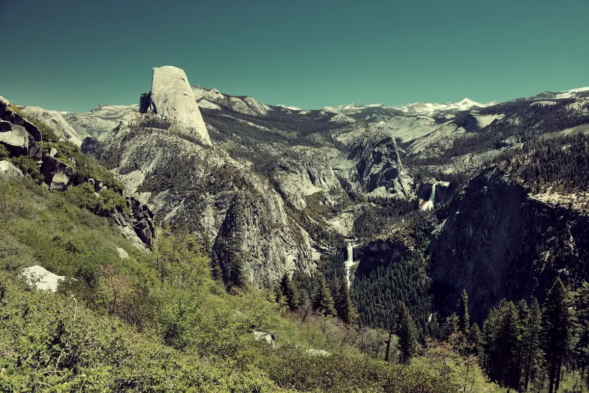 Yosemite mountain ridge with waterfall
