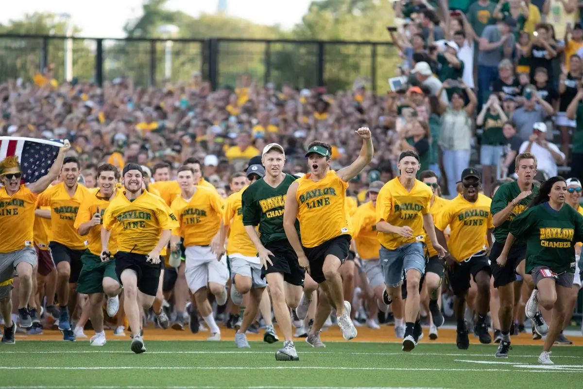 Baylor Line students in their jerseys at a football game