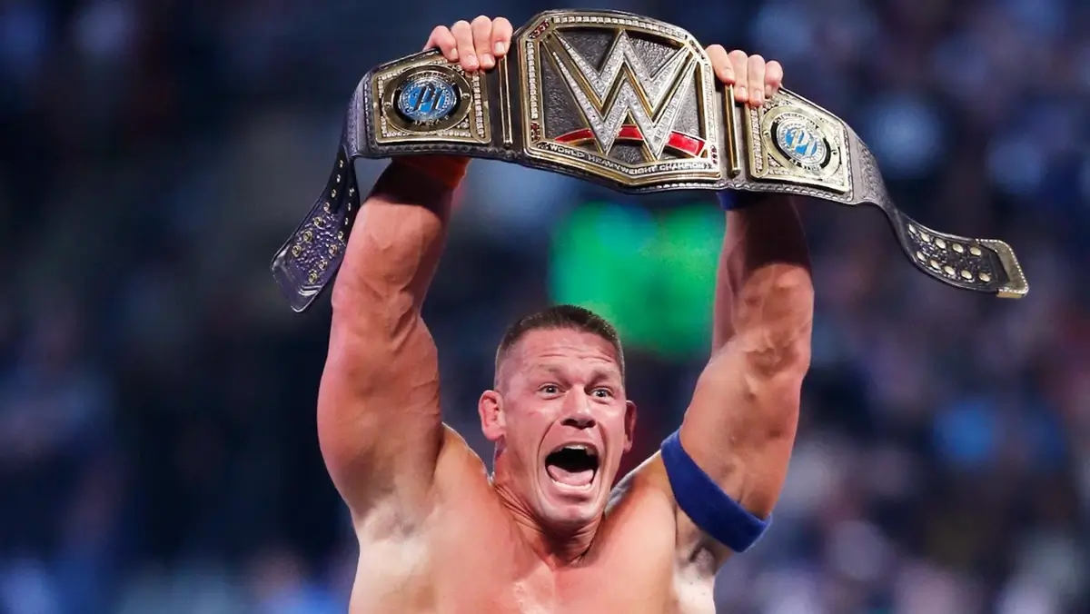 John Cena with the WWE Championship belt