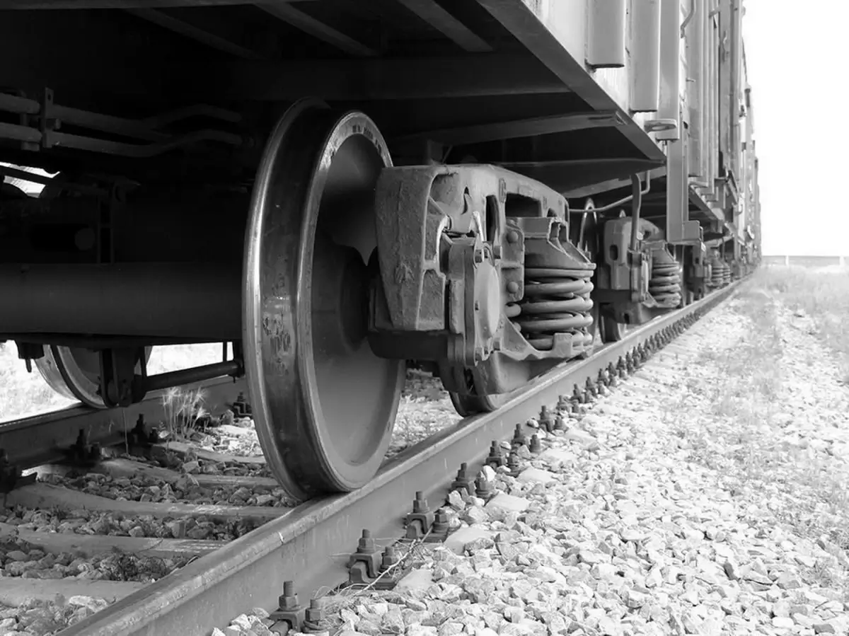 Close-up of a train wheel on a track