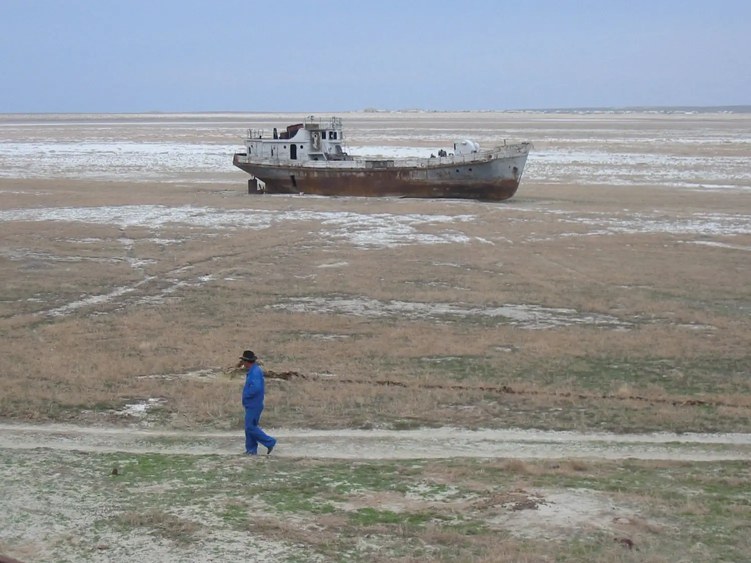 Rusting ships stranded on the sandy expanse of the Aralkum Desert